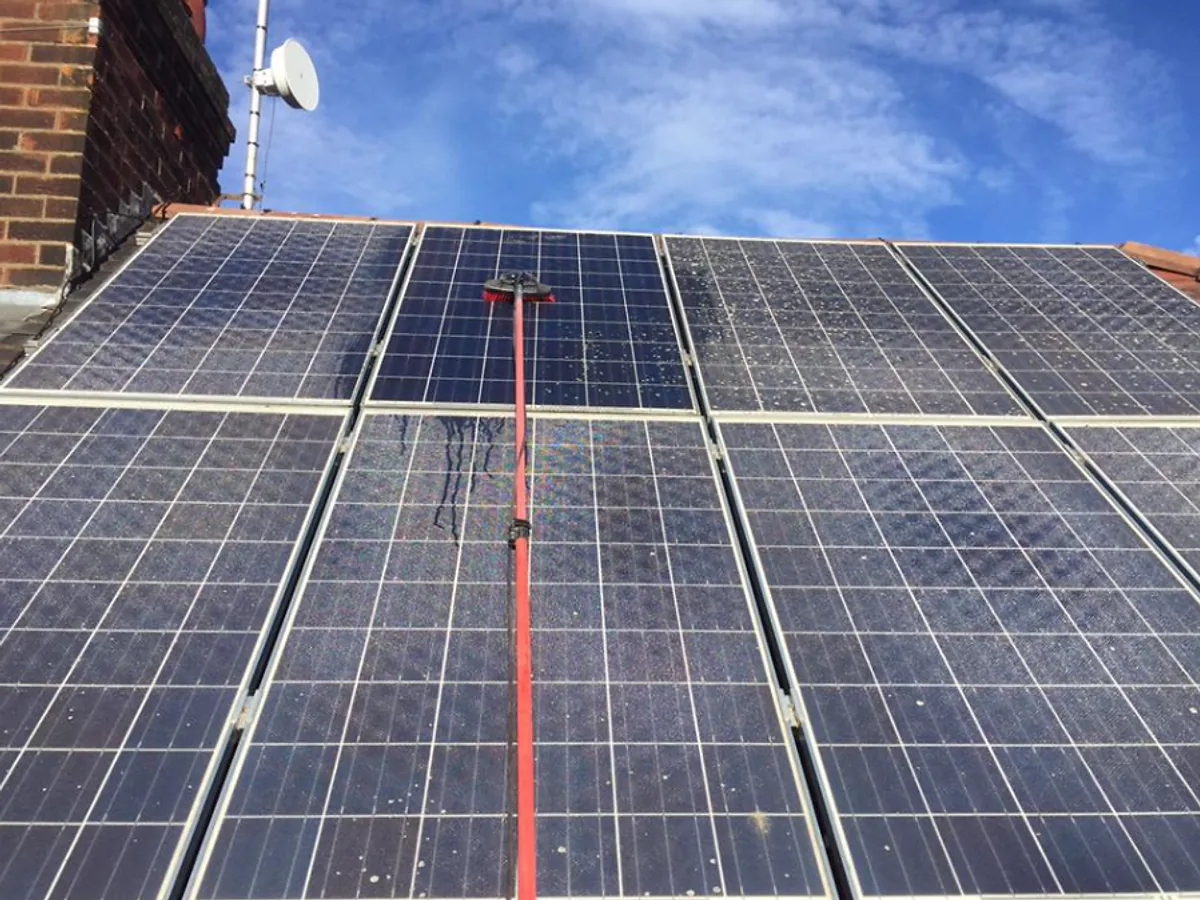 Solar panels being professionally cleaned